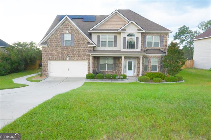 This home is packed with value. Super spacious 5 bedroom and 3 full baths featuring solar panels, a newer roof, and a sunroom. This home offers timeless comfort in a desirable neighborhood. From the moment you walk in, you'll feel the warmth and care that went into this gem. Bright open concept with a granite island in the kitchen gives a true flow through the main living areas. The Family dining is perfect for gatherings and if you're looking for even more entertainment space you can check out the huge family room. The primary suite is what some may call enormous, it is complete with it's own sitting area, fireplace, and reading nook. Fenced backyard with tons of space for pets, play, or future additions. Convenience is at your doorstep with Fort Gordon only 15 minutes away, easy access to shopping, food, entertainment, and Diamond Lakes Regional Park is also nearby. This is the special one you have been waiting for!
