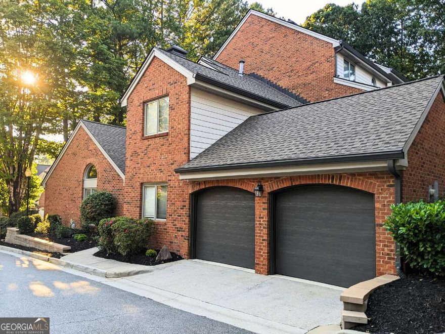 Rare ALL-BRICK END UNIT in the Heart of Sandy Springs - FULLY RENOVATED and Priced to Sell at $525,000 Don't miss this exceptional opportunity to own in Westfair, a boutique community of just 25 townhomes quietly nestled on a cul-de-sac in the Perimeter area of Sandy Springs. Homes here are rarely available-the last sale was over 3 years ago-a true testament to how much residents love living here. This fully renovated 3-bedroom, 2.5-bath end-unit townhome offers nearly 2,000 sq ft of updated living space, including a main-level primary suite with 14-ft vaulted ceilings and a gas fireplace. Crafted with timeless all-brick construction and filled with natural light from windows on three sides, this home offers both durability and warmth. Upstairs, you'll find two spacious bedrooms plus a flexible loft-ideal for a home office, gym, or second living area. INTERIOR HIGHLIGHTS: Remodeled kitchen with Bosch & Samsung appliances, quartz counters, soft-close drawers, and skylight; sunken living room with second fireplace; elegant arched built-ins; two private brick courtyards for relaxing or entertaining; smart garage system; and fresh interior paint. RECENT UPDATES: HVAC system, hot-water heater, roof replaced 2020, interior and exterior paint COMMUNITY FEATURES: HOA covers water, landscaping, exterior maintenance, pest control, and more. New roofs and exterior paint throughout community in 2020. All homes include attached 2-car garages. Minutes to GA-400, I-285, Perimeter Center's shopping, dining, and medical. Close to major corporations in Perimeter Center and just 20 minutes to downtown Atlanta. This home is turnkey, move-in ready-perfect timing to settle in before the holidays. Schedule your private tour today! BUYER'S AGENTS WELCOME!