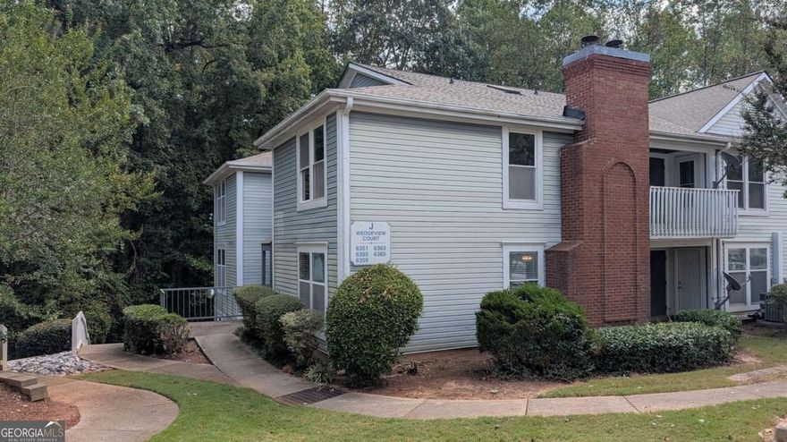 HUGE REDUCTION - Welcome to this well-maintained 2-bedroom, 2-bathroom townhome located in the quiet and highly sought-after Wedgewood community of Tucker, GA. Nestled in an established neighborhood offering swim and tennis amenities, this home strikes the perfect balance of comfort, convenience, and low-maintenance living.  Step inside to an open floor plan featuring a spacious living area filled with natural light and anchored by a cozy fireplace. The well-appointed kitchen includes ample cabinetry, an eat-in dining space, and feature brand-new refrigerator, range and microwave.  Each bedroom serves as a private retreat with its own en-suite bathroom, providing comfort and privacy for both residents and guests AND includes New Carpet throughout main living and bedrooms. Primary suite offers a generous closet and a rear exit for direct access to the rear patio and parking area.  Other features consist of an exterior storage room and assigned parking. The HOA covers exterior maintenance, water, sewer, trash, pest control, pool, and tennis-making this an ideal choice for busy professionals, first-time buyers, or anyone seeking a lock-and-leave lifestyle.  Conveniently located near shopping, dining, parks, and with easy access to I-285 and I-85, this Condo is a true gem in a connected yet tranquil community.  Vacant-Go and Show. Schedule through ShowingTime. For questions or alternative access, please contact the listing agent.  CASH ONLY  See FOR SALE sign in Window.  Enter from rear patio.