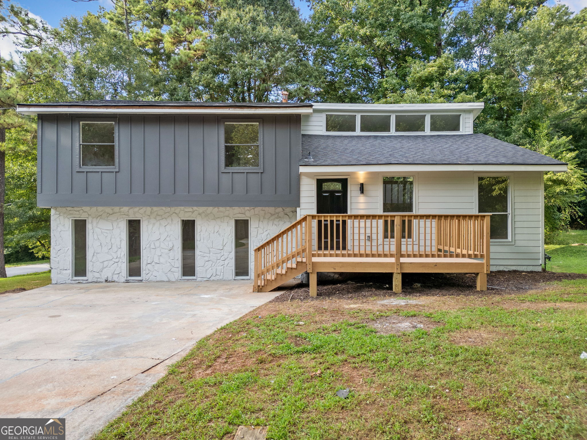 Welcome to 4050 Daron Ct in Ellenwood, GA-newly renovated and ready for move-in! This charming 4-bedroom, 3-bath split-level home sits in a quiet cul-de-sac within the established Chimney Ridge community. Enjoy all-new stainless steel appliances, fresh flooring and paint throughout, and updated fixtures that bring a modern touch to every room. The spacious layout includes multiple living areas, a cozy fireplace, and bottom floor laundry. Outside, you'll find a large yard and a dedicated shed for extra storage. Conveniently located near I-285, I-675, and I-20, with easy access to shopping, dining, and schools. Section 8 is welcome-schedule your showing today!