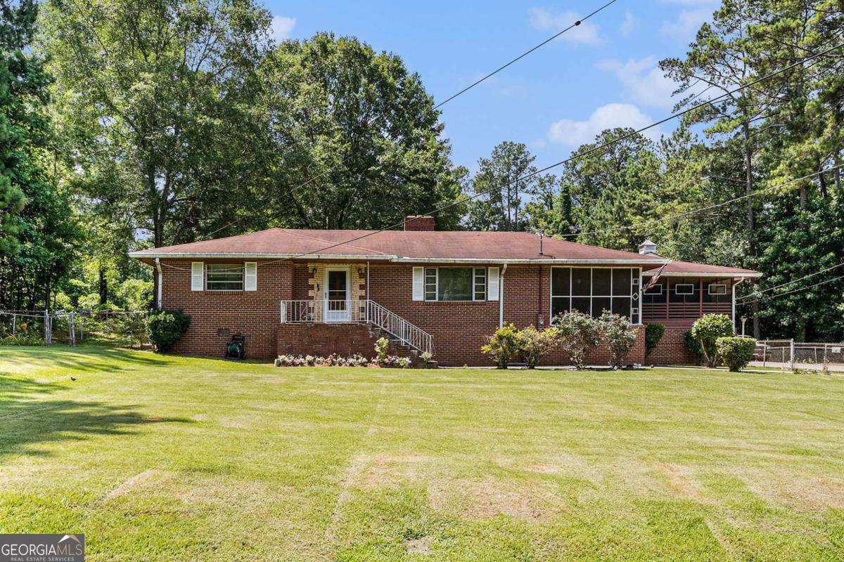 Welcome to 2247 Cypress Avenue - offering comfort, convenience, and value. Nestled on a quiet, secluded lot in an established neighborhood, this inviting home boasts a spacious floor plan filled with areas to create memories in. Step into the cozy living room, ideal for relaxing or entertaining, and enjoy a seamless flow into the dining area and kitchen, complete with ample cabinetry and counter space. The generously sized bedrooms offer peaceful retreats, while the primary suite includes its own private bathroom for added comfort. The home offers several porches, screened and enclosed that allow for peaceful enjoyment of indoor/ outdoor living. The lower basement level offers an additional potential for living space, storage space, etc. Outside, the large, level backyard is perfect for family gatherings, pets, or weekend barbecues. With a driveway for convenient parking and a low-maintenance exterior, this home is move-in ready and ideal for first-time buyers, downsizers, or investors. There are two additional dwellings located on the lot, perfect for tenant income, in law suites, guest houses etc. The possibilities to maximize on all this property is endless. Located just minutes from I-75, Southlake Mall, restaurants, and parks, you'll love the easy access to everything Morrow has to offer. Don't miss your chance to make this charming property your new home - schedule your tour today!
