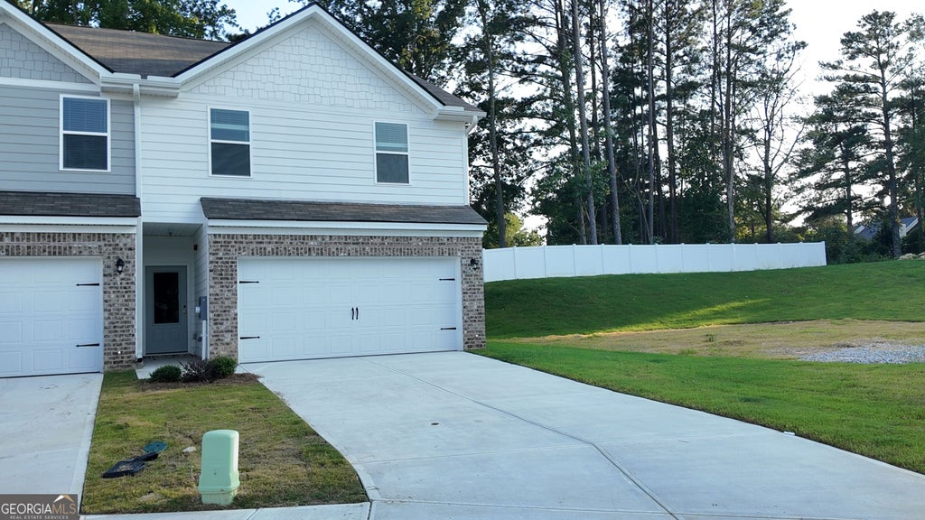 Photo of 5455 Biltmore Drive, Atlanta, GA 30349 (MLS # 10838872)