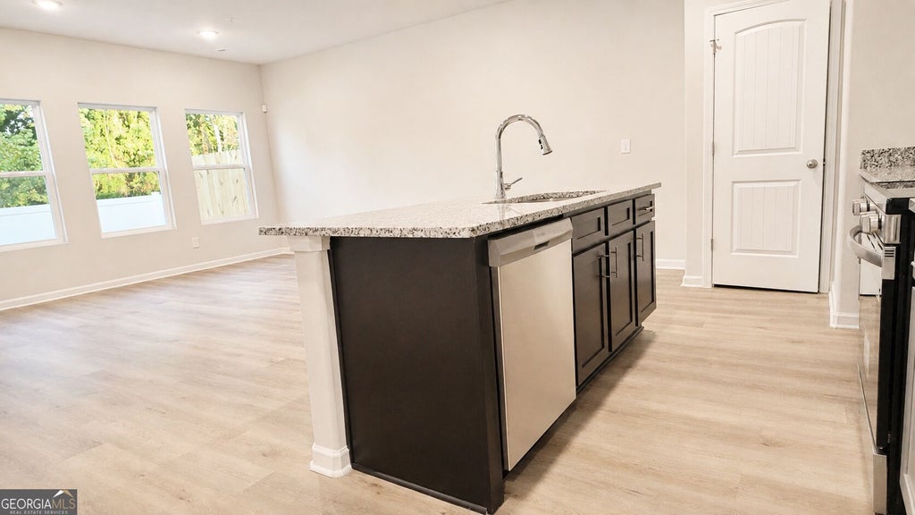 Photo of 5455 Biltmore Drive, Atlanta, GA 30349 (MLS # 10838872)