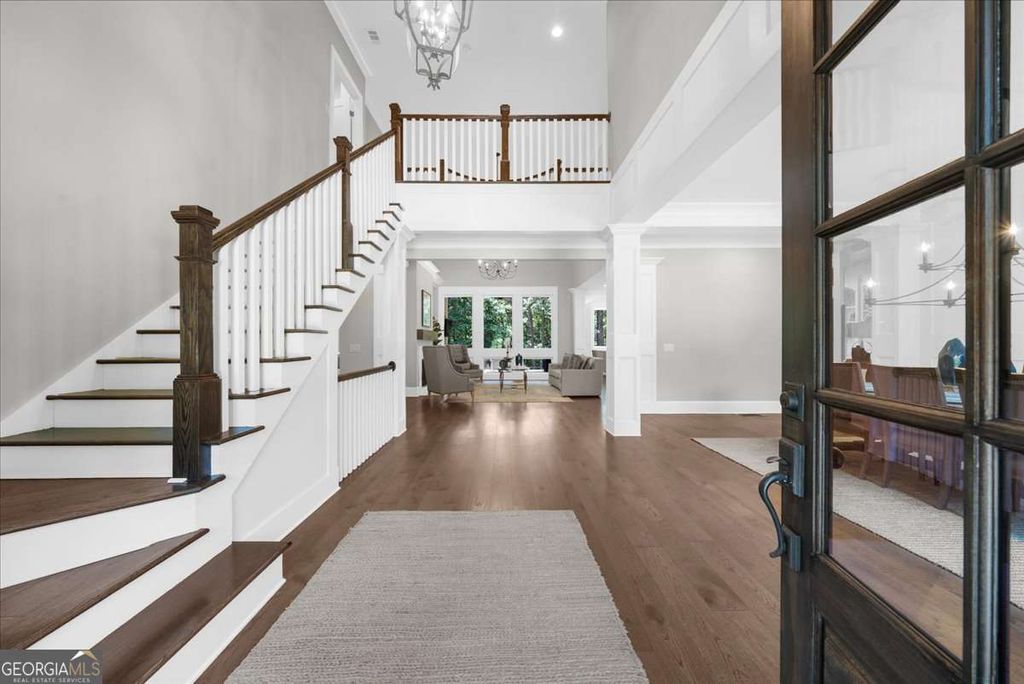 Photo of 6806 Misty Cove Ln, Flowery Branch, GA 30542 (MLS # 10661883)