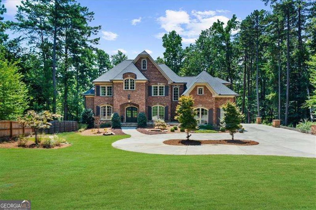 Photo of 6806 Misty Cove Ln, Flowery Branch, GA 30542 (MLS # 10661883)