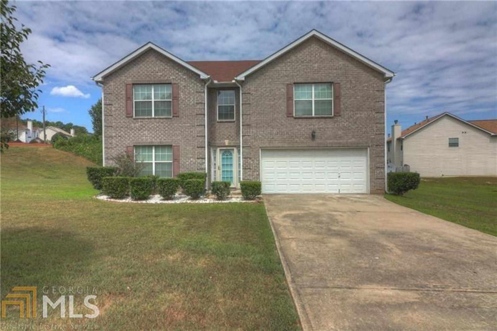 Move-In Ready ! One Owner, 2-Story Brick-Front Home with a BR & Full BA on the Main Level on a Corner Lot in a Small/Quiet Subdivision. Freshly Painted Interior includes New Hardwood Floors on the Main Level, Separate Dining Room, Open Kitchen with Plenty of Cabinet Space & a View to the Family Room. Over-Sized Master Suite with Sitting Room, Large His & Hers Walk-In Closets, Double Vanity, Garden Tub & Separate Shower. Freshly Painted Exterior includes a Patio & Big Backyard for Entertaing/Relaxing. Great Location near I-675, I-285, I-75 & the Airport. Will Sell Fast !
