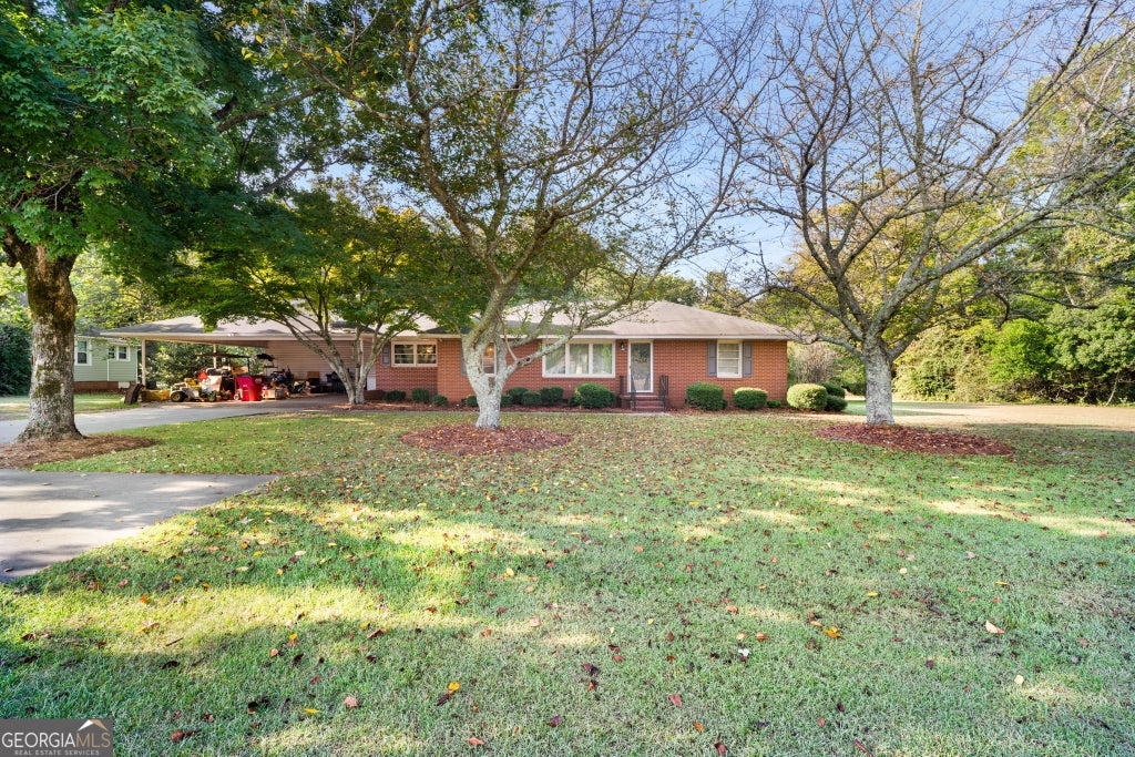 Photo of 813 W Church Street, Sandersville, GA 31082 (MLS # 10841636)