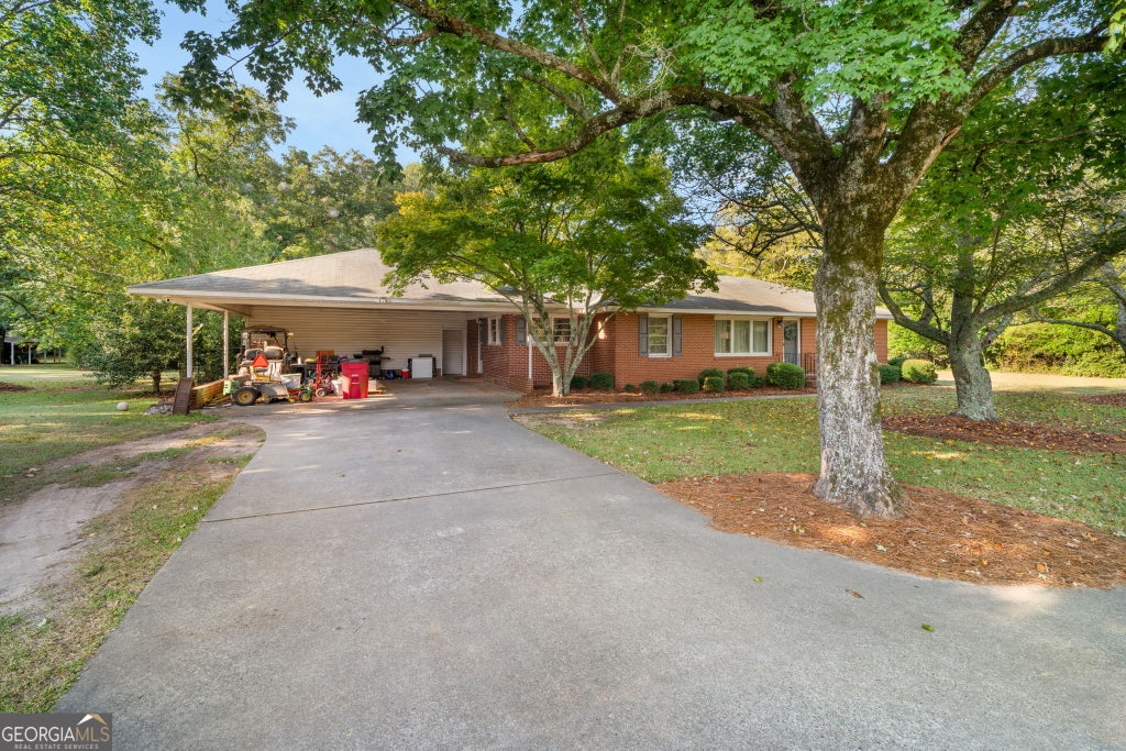 Photo of 813 W Church Street, Sandersville, GA 31082 (MLS # 10841636)