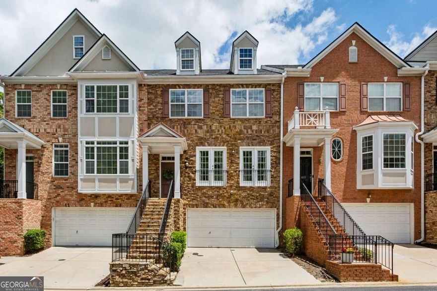MOVE-IN READY PERFECTION in DREAM Vinings location... right inside the perimeter!!! Easy access to 285, 75, Buckhead, Midtown, Smyrna, Truist Park/The Battery, and so much more... plus minutes to Cumberland, Chattahoochee Trail Park, with DIRECT SILVER COMET TRAIL & BELTLINE ACCESS... STEPS from the home!!!!! Main floor features open floorplan with beaming natural light throughout, gleaming hardwoods, spacious living room, gorgeous, just-updated powder room, eat-in kitchen with BRAND NEW stainless steel dishwasher and fridge, spacious island and separate dining space, cozy fireplace, and plenty of storage and cooking space... walk right out to your quiet, private, spacious deck -- an entertainer's dream!!! Upper level offers ample space and functionality with two oversized bedrooms, both with sparkling en-suite full bathrooms! Primary bedroom boasts tray ceilings and a bathroom that was literally JUST RENOVATED to the nines with high-end finishes, gorgeous new vanity, light and plumbing fixtures, tile flooring, frameless glass shower and so much more... plus AMAZING WALK-IN primary closet with built-in closet system!!! Secondary upstairs bedroom is not to be missed -- the space is unbelievable! Plenty of room for bedroom AND office furniture in one room!!! BRAND NEW UPSTAIRS CARPET to be installed this month!!!! Lower level provides easy access to spacious TWO-CAR GARAGE, plus third bedroom that is absolutely multifunctional... a HUGE suite! The perfect third bedroom, office, bonus living room, game room, man-cave, you name it... OR, large enough to be a combination of any of those things! Ensuite full bath attached to lower level bedroom. Nestled in a quiet community in ideal location, this beautifully updated, move-in ready home has it ALL!