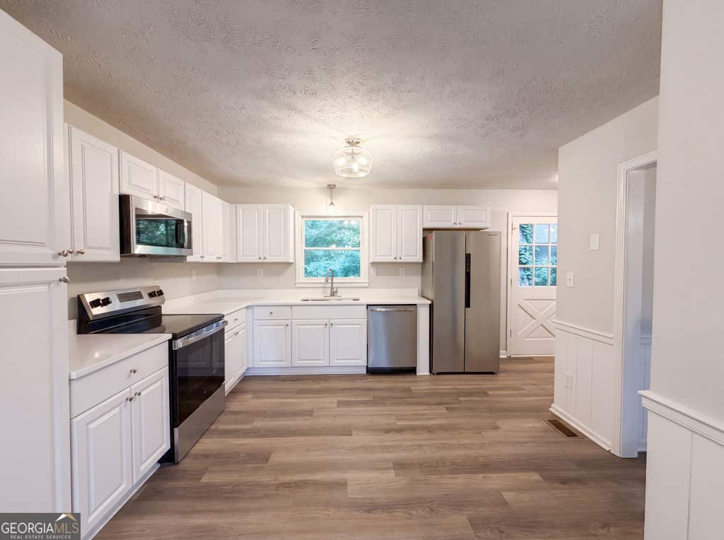 Photo of 3005 Country Walk Drive, Powder Springs, GA 30127 (MLS # 10819282)