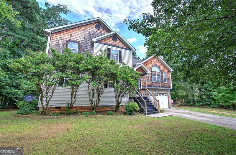 Investor Special or DIY Dream! Welcome to 95 Greatwood Dr, a spacious split-level home offering instant sweat equity and priced well below other homes in the neighborhood! With 4 bedrooms and 3 full bathrooms, this fixer-upper has great bones and endless potential. The main level features 3 bedrooms and 2 baths, while the lower level includes a 4th bedroom, an additional full bath, and a versatile bonus room or second living space - ideal for a home office, teen suite, or media room. Enjoy outdoor living with two expansive decks, perfect for entertaining or relaxing, plus a fenced-in backyard for pets and privacy. With a little TLC, this home could be a true gem in an established neighborhood. Don't miss out on this opportunity to create value and make it your own!