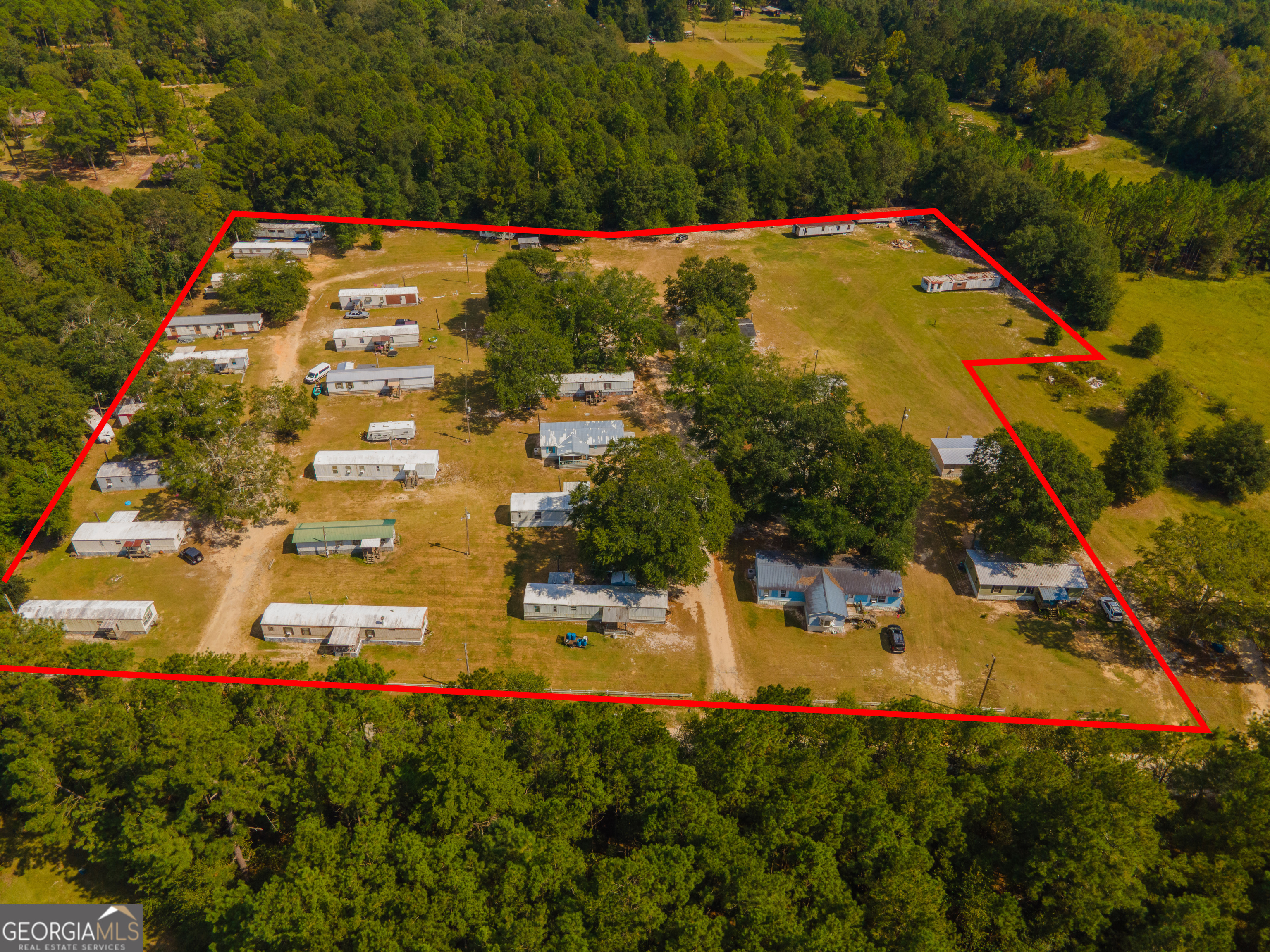 Discover an exceptional income-producing property with Deer Oaks Mobile Home Park, situated on 7.75 acres. This established park offers 25 mobile homes and 3 campers, all currently occupied, along with a waitlist that ensures consistent demand. With room to expand by adding up to 10 additional mobile homes, this property has the potential to generate $20,000+- per month at current rent rates, if 10 more mobile homes are added. This is a great investment for those seeking long-term passive income. Deer Oaks Mobile Home Park is located just 35 minutes from Statesboro and 30 minutes from Waynesboro. Rental properties in the area are limited, which further enhances this park's strong occupancy and long-term growth potential. Whether you're a seasoned investor or looking to expand your portfolio, Deer Oaks Mobile Home Park is a rare chance to own a thriving investment with proven income and significant potential for future growth. Schedule your tour today!