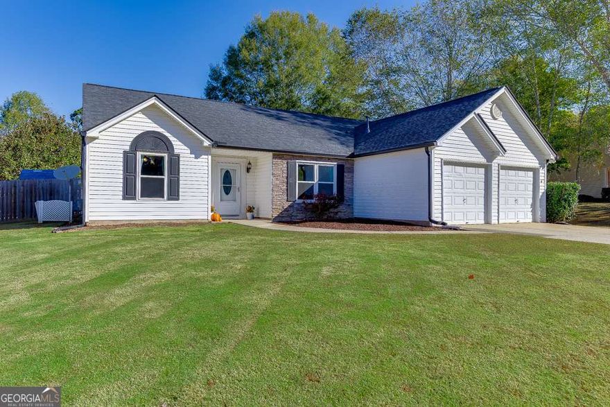 This fully remodeled ranch in the highly sought-after Poole's Mill school district offers the perfect blend of modern luxury and timeless charm, situated on a beautiful half-acre corner homesite in one of the area's most desirable communities - Ridgebrook. Renovated inside and out with high-quality finishes, this home is truly better than new and completely move-in ready.    The open-concept layout features new luxury vinyl plank flooring throughout and fresh interior paint. A stunning new kitchen anchors the living space with abundant custom cabinetry, granite countertops, all-new stainless steel appliances, and an oversized island perfect for entertaining. The kitchen opens to a vaulted great room with a cozy fireplace, creating a seamless space for gathering and relaxation.    The spacious primary suite offers a private retreat with a fully remodeled bath, complete with custom tile, a walk-in shower, soaking tub, and a custom walk-in closet. The guest bathroom has also been thoughtfully updated with modern finishes.    Enjoy outdoor living at its finest with two newly built decks and a newly poured concrete slab that enhances the space for entertaining. A massive, level backyard with new side gate and extended fencing provides privacy and functionality. Additional upgrades include a new roof and gutters with a transferable warranty, new energy-efficient windows, new water heater, new fans and light fixtures, and many more-assuring years of worry-free, comfortable living.    Located in quiet Ridgebrook, residents enjoy access to a community park with playground (with a new one coming soon) and close proximity to the La Mariposa USA Polo Club-one of Georgia's rare live polo venues. All of the conveniences of downtown Cumming (grocery stores, restaurants, parks, farmers market, hiking, biking, and walking trails) are just minutes away, yet far enough to enjoy peace and space.    This is a rare opportunity to own a better-than-new home with thoughtful upgrades in an established neighborhood and top-rated schools. Book your private tour today before it's too late.