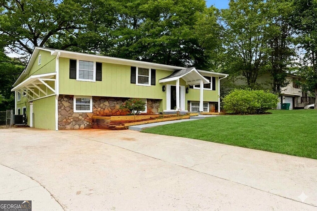 Photo of 4780 Big Valley Road, Stone Mountain, GA 30083 (MLS # 10867259)