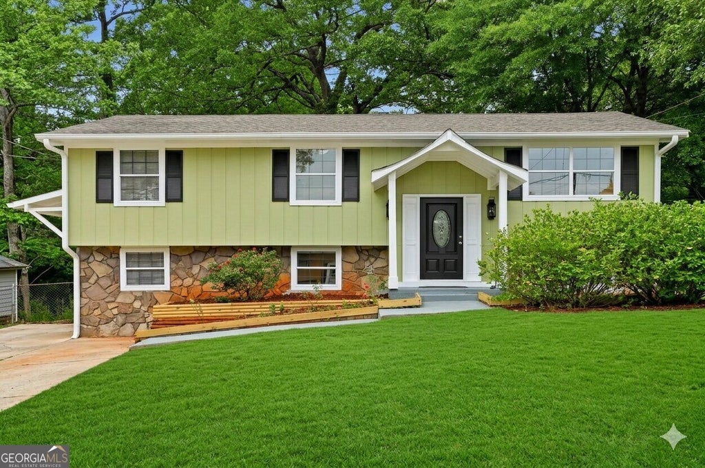 Photo of 4780 Big Valley Road, Stone Mountain, GA 30083 (MLS # 10867259)