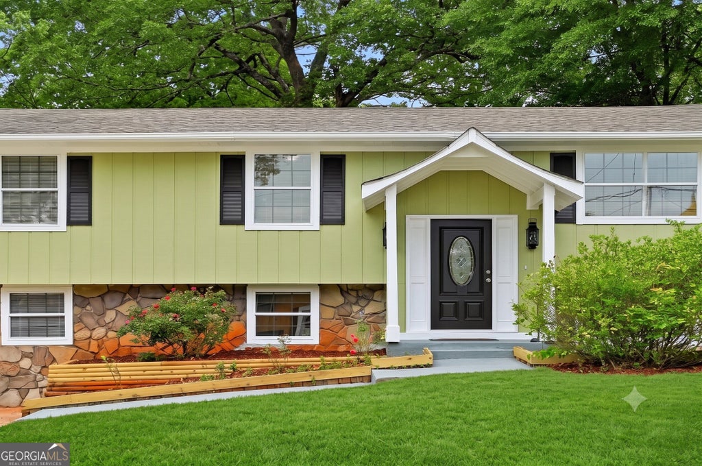 Photo of 4780 Big Valley Road, Stone Mountain, GA 30083 (MLS # 10867259)