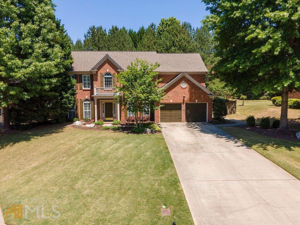 This is the home you've been waiting for in the community you've been waiting on. Check out this beautiful 4BR home in Suwanee's highly sought after gated Edinburgh Community. This pristinely maintained, all brick home is nestled on a desirable cul-de-sac lot and features hardwood floors throughout the main floor, open kitchen, large covered patio, 2 story foyer and living room perfect for entertaining. The private and peaceful backyard is fenced and lined with mature greenery. It is conveniently located only minutes from Settles Bridge Park, Suwanee Town City Park, restaurants and shopping and highly rated North Gwinnett Schools . The Edinburgh Community has wonderful amenities including an award winning golf course, clubhouse, swimming pool, tennis, exercise facility and playground. See it today before it's gone!