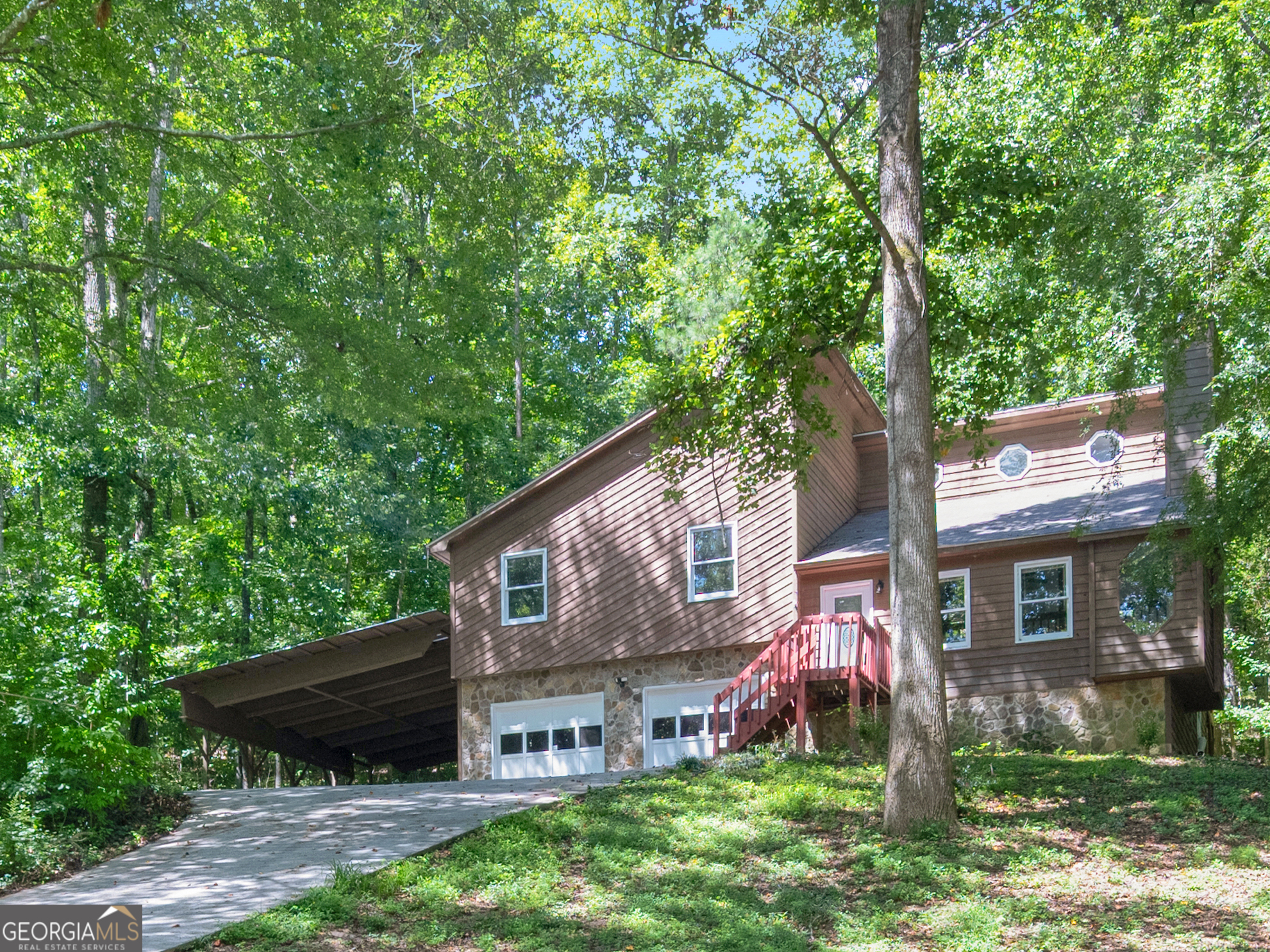 Nestled on a sprawling, private wooded lot in a cul-de-sac, this charming Stockbridge home offers the perfect blend of tranquility and convenience. Move-in ready and freshly painted, this delightful property boasts a host of upgrades including new air conditioner, deck and water heater. With a roof only 5 years young, you can enjoy years of worry-free living. Embrace the peace and privacy of your wooded surroundings in this lovely cared for home. Call today to schedule to see it.