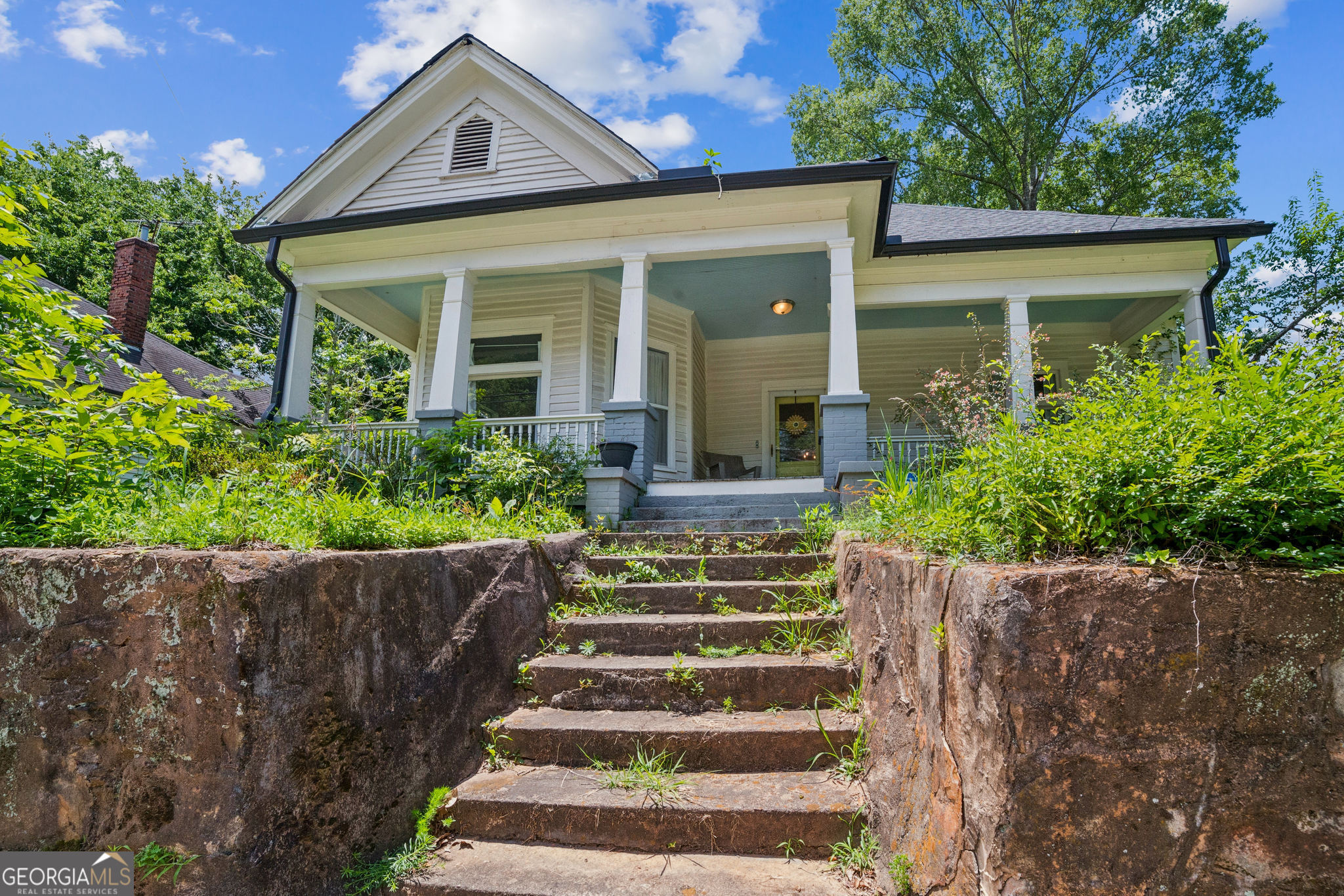 Lovingly 3BR/2BA craftsman bungalow in historic area within a mile of Downtown Newnan. This home has a covered front porch, beautiful wood floors, 3 fireplaces, and updated kitchen. All of this within minutes of Newnan, Ashley Park, Piedmont Newnan Hospital, easy interstate access. Use Showing Time.