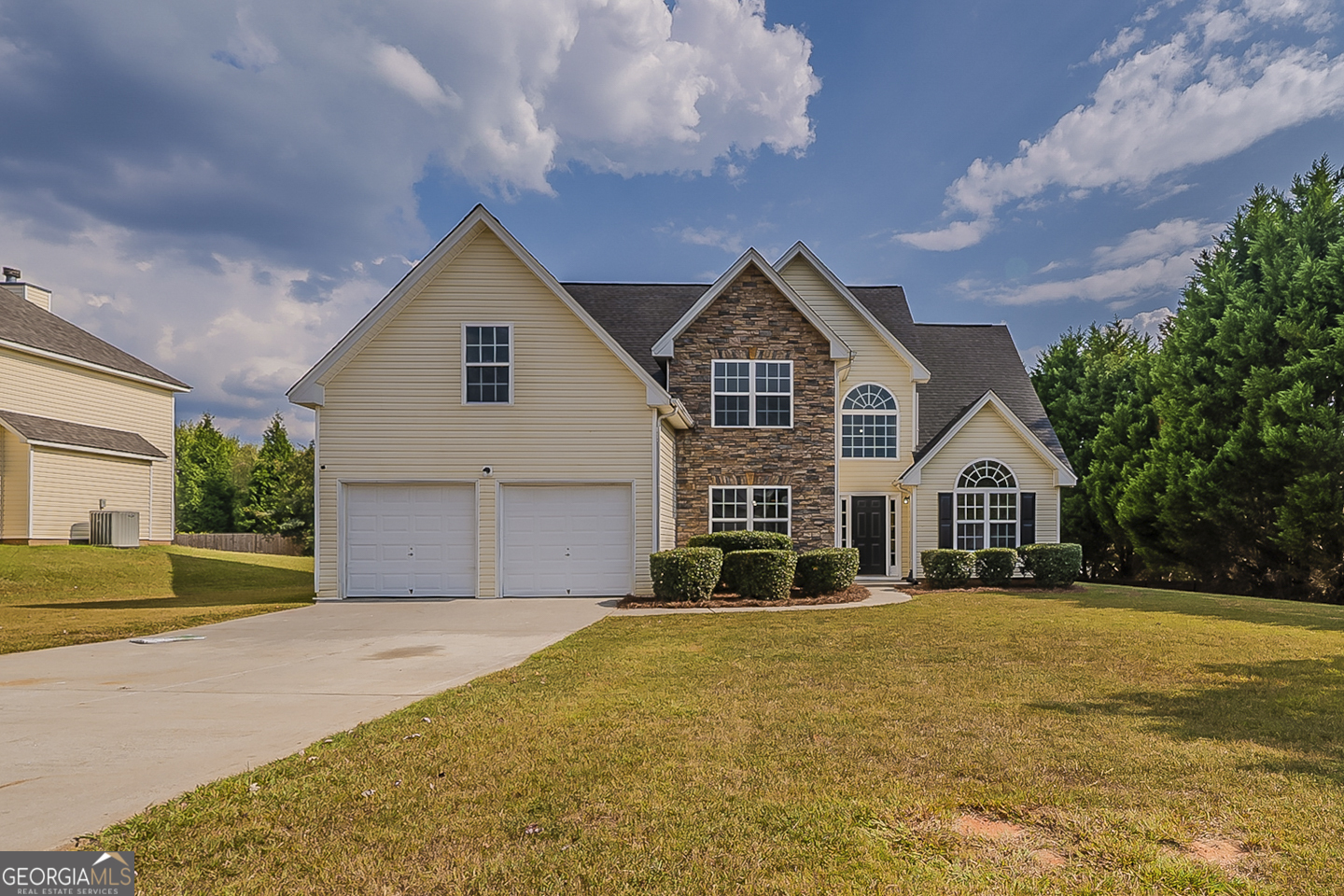 This beautifully updated home features a new roof, fresh interior paint, new carpet, LVP flooring, and stylish light fixtures. The kitchen shines with new cabinets, quartz counters, and a stainless steel appliance package including range, microwave, and dishwasher. Bathrooms have been refreshed, while the living room boasts vaulted ceilings and a cozy fireplace. A new HVAC system adds comfort and peace of mind, making this home truly move-in ready.