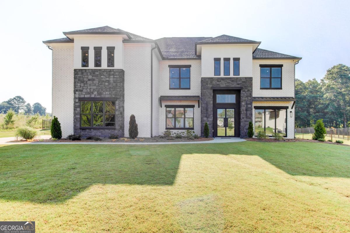 Nestled on a private cul-de-sac lot, this luxury custom home by SmithBuilt Communities showcases the perfect blend of modern design and everyday comfort. The sought-after Klondike floor plan offers 5 spacious bedrooms and 4 full baths, highlighted by soaring 10-foot ceilings on both levels and upscale finishes throughout. At the heart of the home, a striking quartz fireplace wall anchors the open-concept living space, while the chef's kitchen impresses with floor-to-ceiling cabinetry, double ovens, a pot filler, waterfall island with matching backsplash, and wide-plank wood flooring that runs throughout. Step outside the primary suite to your oversized porch, ideal for coffee or quiet moments, overlooking a massive, fully fenced backyard. With every detail thoughtfully designed, this stunning resale is ready to welcome you home-schedule your private tour today.