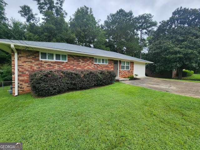 Beautifully renovated 4 Bedroom/2 Bathroom brick ranch in Smyrna's coveted Forest Hills neighborhood available for immediate move in! The kitchen features quartz countertops, shaker cabinets, and brand new stainless steel appliances. The primary suite offers a large walk-in closet, brand new carpet, and new walk-in frameless glass shower and double vanity. Living area is open concept, including a dining area off the kitchen. Outside you'll find a large deck and flat ,fully fenced yard, which backs up to Tolleson Park, which offers swim/tennis/pickleball/playground/walking path/baseball/soccer fields. The home is in the perfect location: walking distance to Smyrna Market Village shops/restaurants/parks/playgrounds/splash pad/library/community center, and just a few miles from The Battery/Truist Park Braves stadium. Rent includes the following: all kitchen appliances including refrigerator, washer & dryer. Pets allowed with a $500 pet fee. Owners are open to a multi-year lease. Will include biweekly landscaping for a lease starting in August!