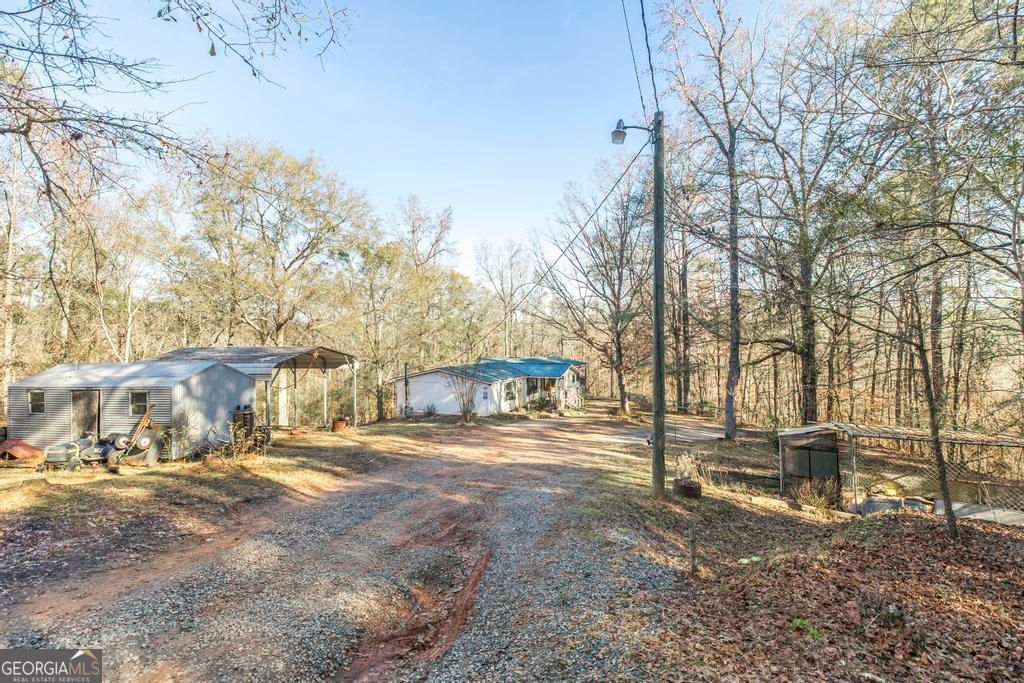 Photo of 281 Back In The Woods Way SE, Milledgeville, GA 31061 (MLS # 10657674)