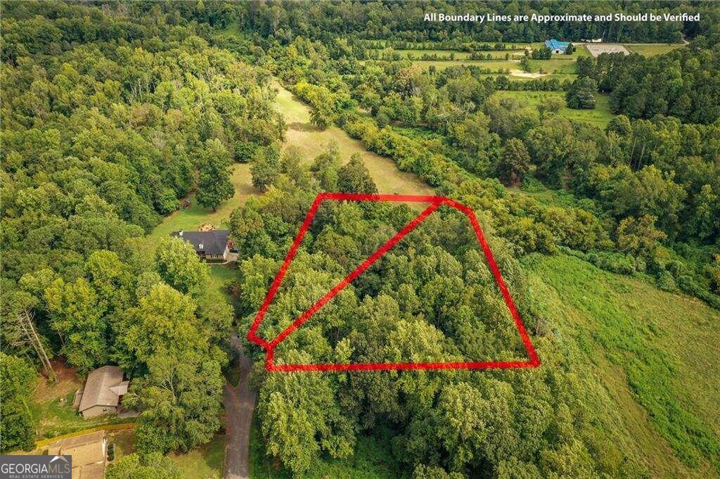 Discover the perfect spot to build your dream home on this large, wooded lot with abundant trees and serene, seasonal mountain views. This beautiful property backs up to Thalley Creek, offering a tranquil natural setting. Located in a peaceful, small neighborhood with no through traffic, youCOll enjoy privacy and quiet living. Lots 11 and 12 are available, giving you flexibility to choose the ideal site or purchase both for added space. Conveniently close to Highway 20 and 400, this lot combines the beauty of nature with easy access to major routes. DonCOt miss this rare opportunity!