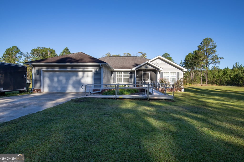 Photo of 164 Leonard Hughes Road SW, Ludowici, GA 31316 (MLS # 10876687)