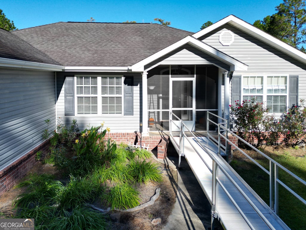Photo of 164 Leonard Hughes Road SW, Ludowici, GA 31316 (MLS # 10876687)