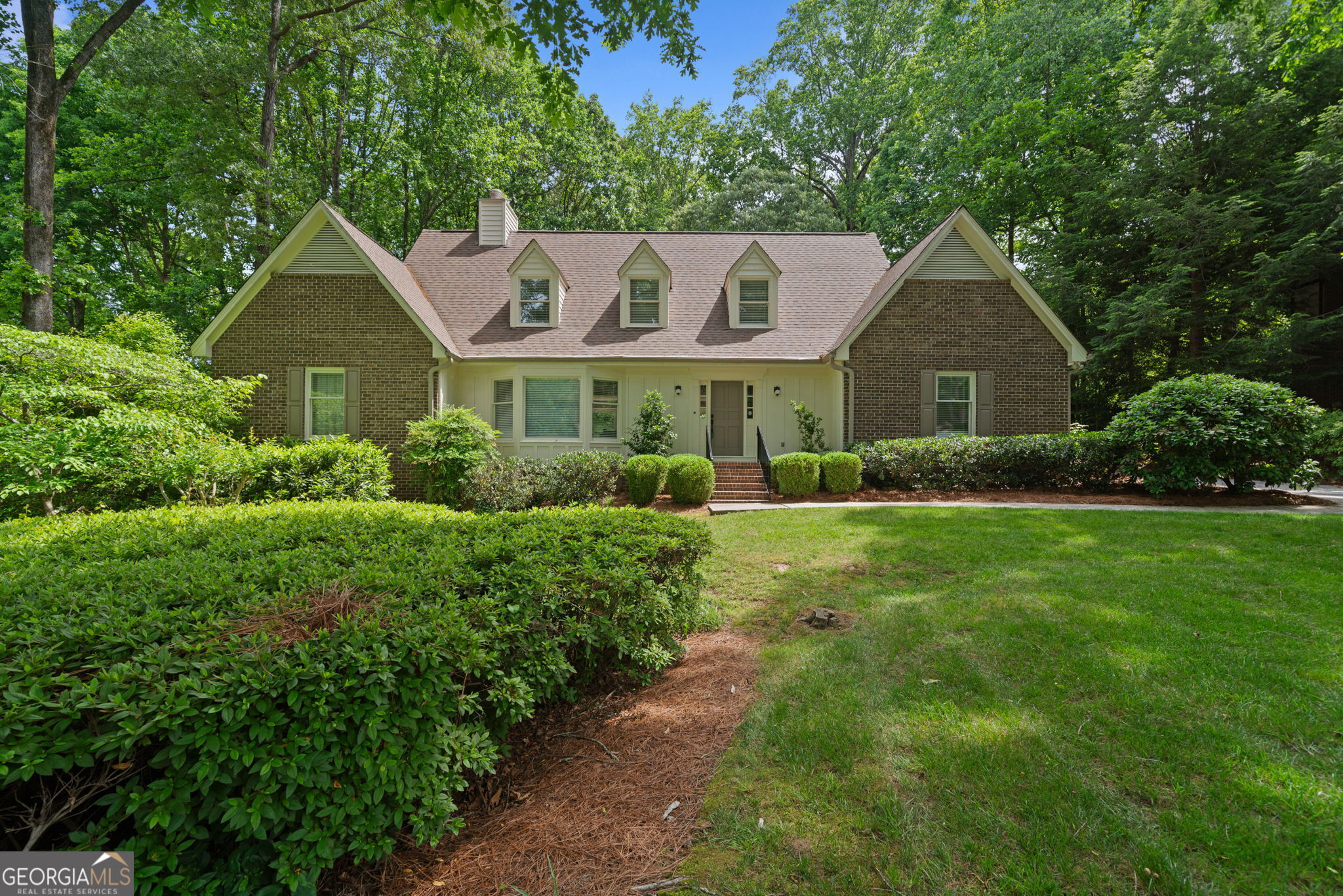 STUNNING EAST COBB TOP TO BOTTOM DESIGNER QUALITY RENOVATION! Classic Cape Cod beauty with all todayCOs panache. 5 bedrooms and 4 baths! Space for everyone. You cannot help but love the nearly 1 acre lot with its tranquil private flat landscaped lot full of perennials and trees. Inviting, warm and modern design mixed with timeless architecture in this custom built home. All new cabinets throughout. Added 42 inch upper cabinets in the kitchen for extra storage. Amazing redesigned eat in kitchen with all new cream colored shaker style cabinets, stainless steel appliances and beautiful unusual quartz counters and backsplash accented with gold hardware. Entry to the stone patio and gorgeous yard from the adjacent dining area too for convenient grilling and outdoor living. The oversized dining room is perfect for entertaining. Huge living room with gorgeous fireplace, wood beam mantel, built in bookcases, beamed ceiling with views to the front and back yard. So much natural light. The primary suite is on the main level with ensuite bath straight out of a magazine. Enter the primary bath through barn doors to two separate vanities, framed mirrors, gorgeous lighting and soaking tub. There is also a full ensuite for your guests, a nursery or an office on the main level with a full bath including a stepless tiled shower. Two additional large bedrooms are up the stairs with another great bathroom, fully updated with new double vanity, lighting, mirrors, faucets and custom tile pattern around the tub. And there is still more great space on the terrace level Co new custom cabinetry for a bar space, plenty of game room space and a bedroom and full bath. Great storage space too. Brand new luxury LVP throughout the first floor and premium carpet upstairs. Nothing overlooked - every light fixture, outlet, light switch, hinge and knob. A clean new epoxy flooring in the double garage. Newer roof and windows, HVAC and water heater make this a carefree and excellent value in super convenient East Cobb. The home is located in a small enclave neighborhood of custom homes on a cul de sac street. Room to add your own pool, another garage, basketball goal, or more gardens. Just minutes to restaurants, parks, recreation, shopping at The Avenue East Cobb, MerchantCOs Walk, Whole Foods, Historic Marietta Square, the Battery for Braves games. All this in one of the most desired school districts in East Cobb including Eastvalley Elementary, East Cobb Middle and Wheeler High. Don't miss this one in one of metro Atlanta's most coveted areas! Style, comfort, and modern flair all in this rare find in an unbeatable location! Professional photos coming soon.