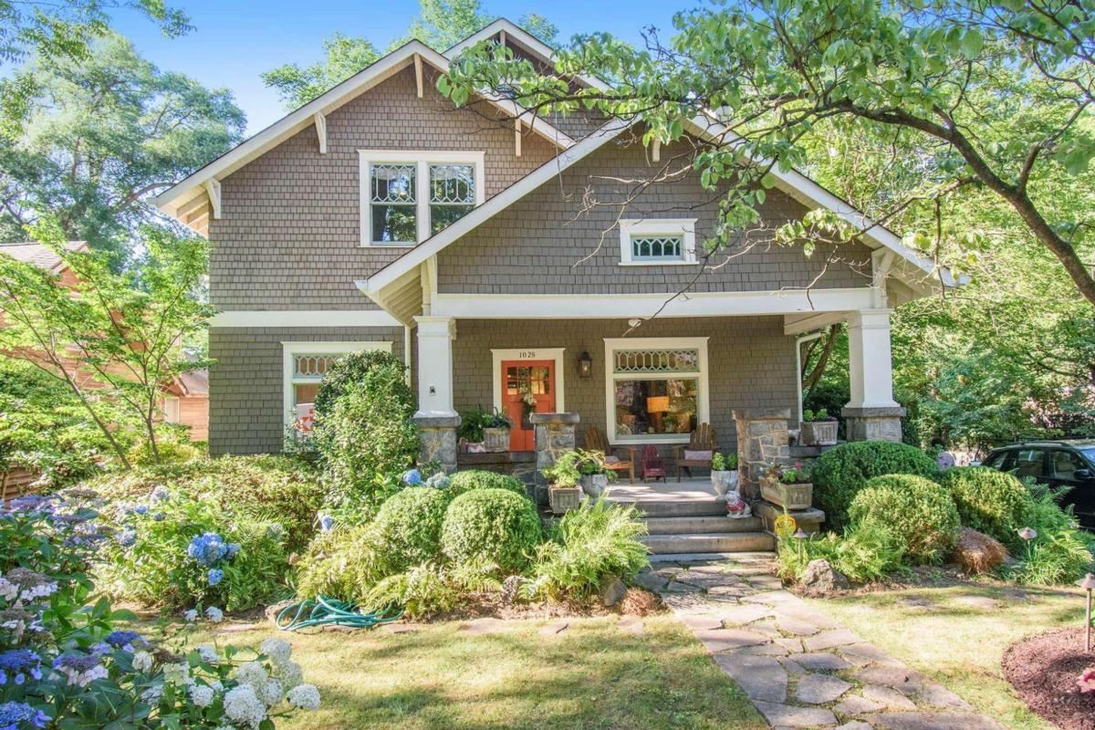 Fabulous 1910 Renovated Classic walking distance to the Beltline, Ponce City Market, Inman Pk & VGHI. This 2 story home lives large w/ 5 bedrooms & 4 baths & a serene screened in porch w/vaulted ceilings that overlook a private astroturf backyard, fountain & garden. True character w/lead glass windows, stone fireplace, coffered ceilings, hardwood floors, keeping room off the large kitchen w/ butlers pantry & an oversized dining room w/a beautiful built in bar. Owners suite is a 10+. Historic front porch is surrounded by lush gardens perfect for n'hood cocktails!