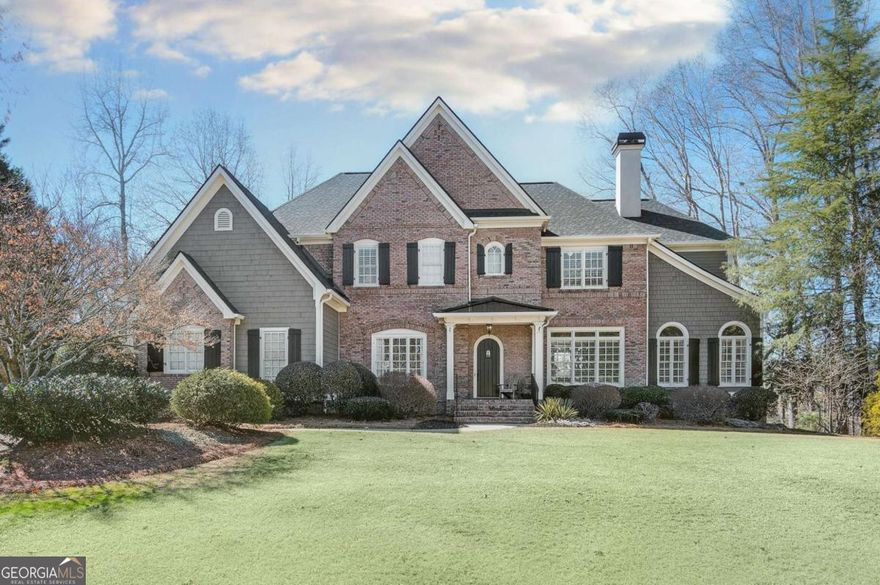 Welcome to this stunning executive home, nestled in the exclusive GATED SECTION of WHITE COLUMNS. With over 7,000 square feet of beautifully finished space spread across three expansive levels, this residence offers the perfect balance of size and warmth. The heart of this home is its spectacular outdoor oasis, where youCOll find a CUSTOM PEBBLETEC POOL, offering endless opportunities for relaxation and fun. Gather around the FIRE PIT area for cozy evenings with friends and family, or enjoy the SCREENED PORCH that brings the outdoors in, providing a tranquil retreat throughout the seasons. For those who love to entertain, the OVERSIZED COVERED DECK is an absolute showstopper featuring a built-in grill and plenty of space for lounging, itCOs the perfect place to host al fresco dinners while overlooking your PRIVATE BACKYARD OASIS. A spacious, flat grassy area is perfect for the kids (human or 4 legged kind) is located behind the pool area. Inside, you will love this thoughtfully designed home, including a unique floorplan that effortlessly balances open living spaces with intimate, cozy retreats. From the moment you step inside, youCOll be captivated by the flowing layout that maximizes every square inch. The chef in your family will love the spacious kitchen that opens up to the cozy fireside keeping room and breakfast area that easily seats 8+. Keep the whole family close by with 3 guest bedroom suites (all with walk-in closets) and the primary suite located on the second floor. You will fall in love with the oversized primary bedroom with adjoining fireside sitting room and expansive spa bath with his/her vanities, walk-in shower and large tub. Retreat to the terrace level for additional living and entertaining space that includes a bedroom, full bath, wet bar/kitchenette, recreation area, and large family room with projector and screen. Don't miss the opportunity to make this EXTRAORDINARY SUN DRENCHED HOME your ownCoevery detail has been thoughtfully designed for the ultimate in living, entertaining, and enjoying life. WELCOME HOME!