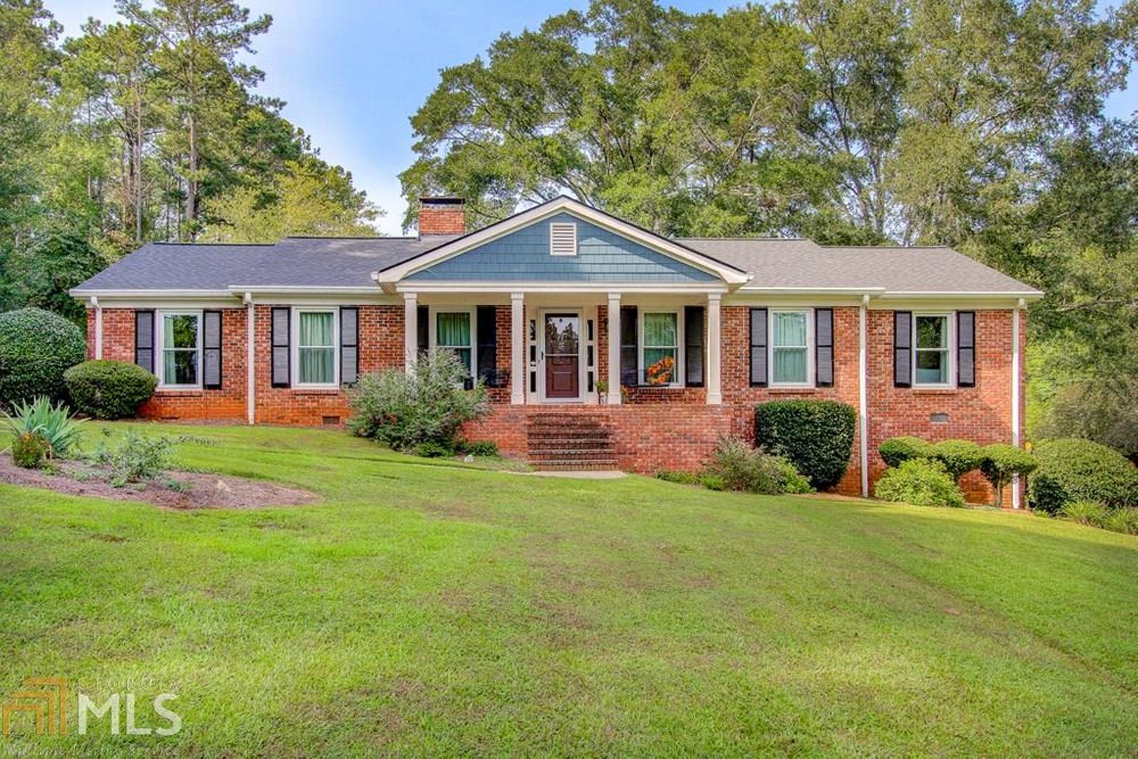 Completely renovated in the last 5 years, this gorgeous all brick ranch home on a basement is move in ready and can close quickly. Updates include remodeled kitchen w/custom cabinets, both baths remodeled w/custom cabinets, concrete driveway, vinyl windows, w/new roof in Sep 2020. Sitting on a huge shaded corner lot, home features hardwood floors throughout, granite countertops, stainless steel appliances. 12x16 outbuilding included.
