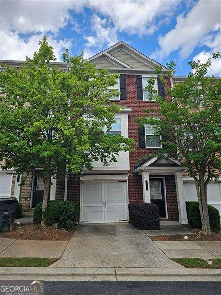THIS BEAUTIFUL TOWNHOUSE IS LOCATED VERY CLOSE TO I-85 AND LOADED WITH UPGRADES THE ASSOCIATION FEE IS INCLUDED IN THE RENT. NEW PAINT, GRANITE COUNTER TOPS, NEW FIREPLACE LVP FLOORING, TILES IN BATHROOMS, GARDEN TUB, NICE SIZE MASTER, DECK ON THE SECOND LEVEL. ONLY TWO CARS ALLOWED (ONE IN GARAGE AND ONE IN DRIVEWAY, NOT STREET PARKING) LANDLORD IS LICENSED REALTOR IN GEORGIA.