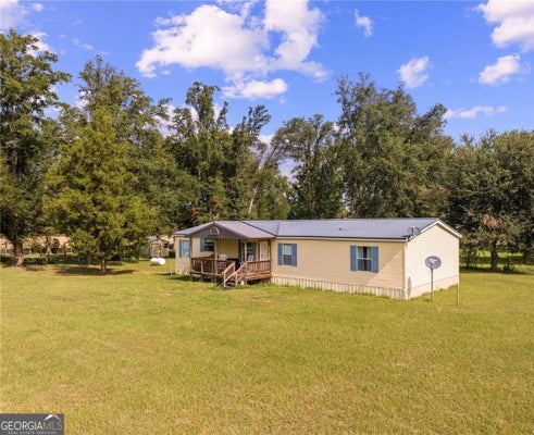 27910 NW 46TH AVE, NEWBERRY, FL 32669 - Image 8c7897aea2e44be8a5287f9c4a977f44/28049191