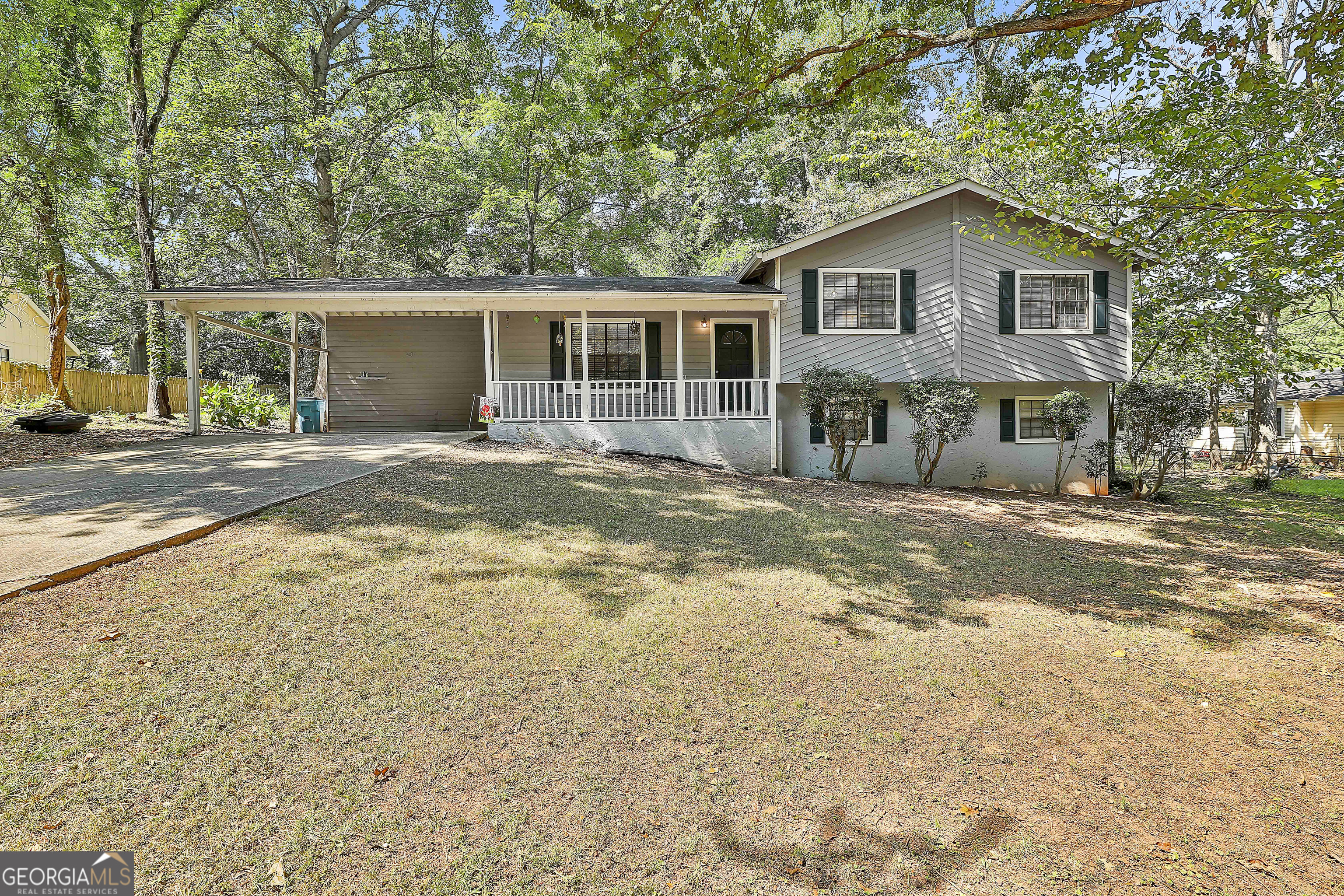 A home with endless potential! Looking for a home to make your own? This 4-bedroom, 2-bathroom split-level is a great opportunity for investors or buyers ready to roll up their sleeves and bring their vision to life. This home offers a solid structure, a functional layout, and plenty of space to work with. The interior has been recently painted and the flooring on the main level was updated. The split-level design allows for versatile living spaces, and the backyard provides a blank canvas for outdoor potential. This property is being sold as-is. Schedule your showing today! NO OWNER FINANCING!