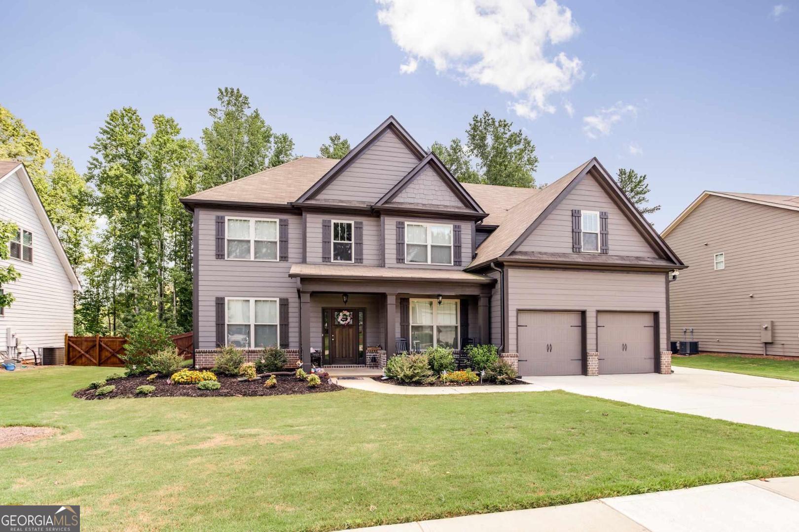 Beautiful Craftsman home in the sought after Jefferson City School District! This house features 5 bedrooms and 3 full baths. Two story foyer, formal dining room, open family room/kitchen with island and stainless-steel appliances, refrigerator included. One bedroom on the main floor with the additional bedrooms upstairs. Large master suite with ensuite master bathroom featuring separate tub/shower. Nice sized guest bedrooms and guest baths. The covered back patio with a fireplace overlooks the fenced in private backyard with playset. Great neighborhood, amenities available for extra fee. I do not advertise on Craigslist. Pets are considered, pet fee required. Must make appointment to see. Call/Text Kim 678-614-5347 for more information. Available 10/1.