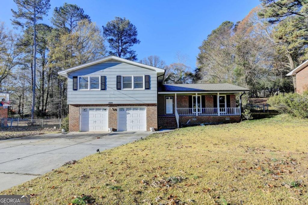 Photo of 1249 Renee Drive SW, Lilburn, GA 30047 (MLS # 10659813)