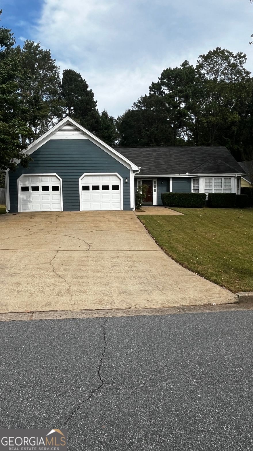 Wonderful one-story home with open concept and lots of natural light, new carpet throughout. Huge, vaulted family room with brick fireplace.  Separate dining room.  Fully equipped kitchen with sunny breakfast area overlooking deck and large level back yard.  Owners retreat on main level with very spacious bedroom with a trey ceiling, walk-in closet, tiled bathroom with dual vanities, tub and separate shower.   Walk-in laundry room on main level.  2 additional bedrooms and a tiled bathroom.  2- car kitchen level garage.  Amazing location and top schools; convenient to Ga400, shopping, dining, community parks, trails, Emory hospital.    Pets allowed on individual basis, pet fee based on breed and size.  Good credit required, income rdatio is at least 3 times monthly rent.