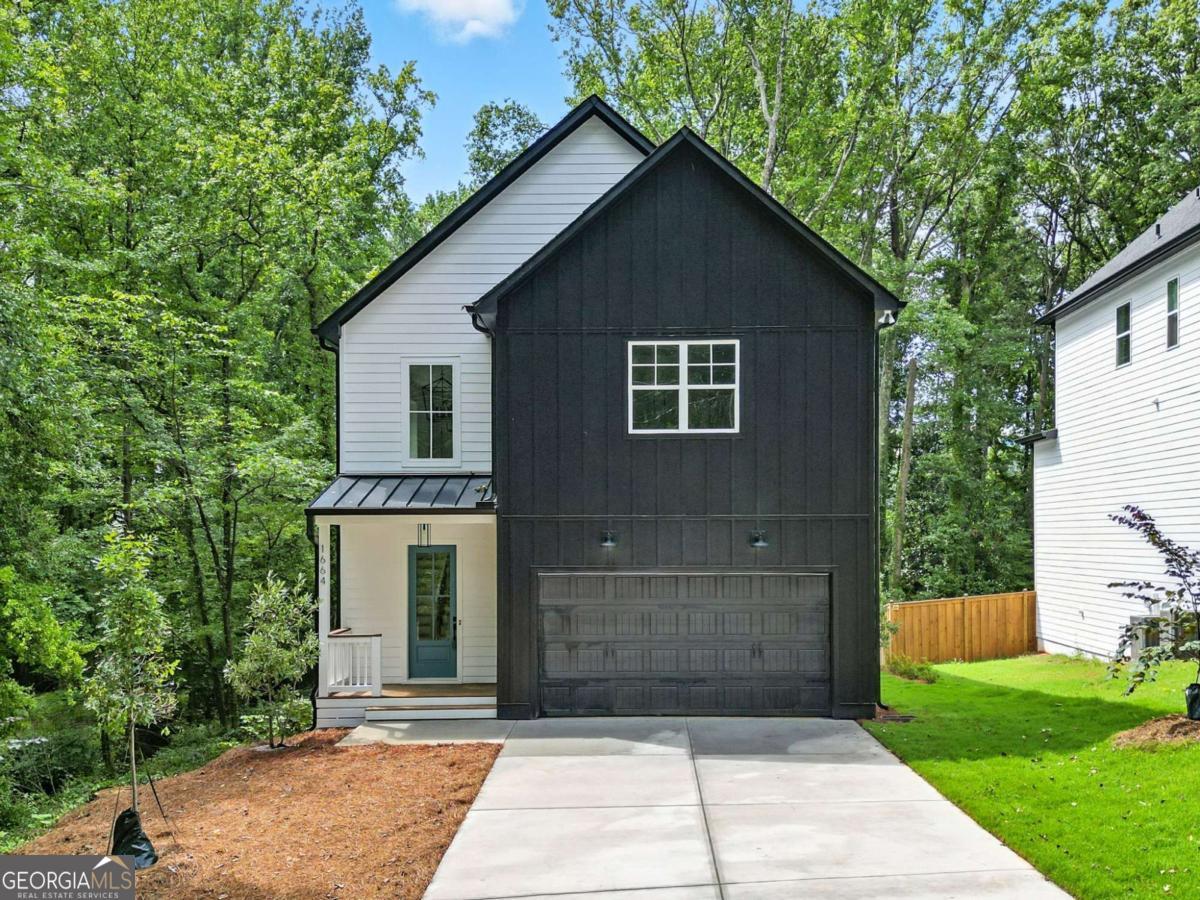 New Construction Ready To Move In - This two Story Home has 4 Bedrooms & 3.5 Bathrooms that Features an Open concept Kitchen with quartz Counter tops, Tile Backsplash, Stainless Steel Appliances, Large Island with views to the Breakfast Area & Family room. Beautiful covered porch and huge covered deck. Large owner's suite room and private bath room with Large Walk-In Closet and freestanding tub. Laundry on the upper level. Home has a full unfinished Daylight basement, stubbed for bathroom, private back yard. Large two car garage. No HOA! Quiet neighborhood, easy highway access. Near Truist Park, shopping and restaurants. Southern Living Custom Builder. Seller is offering 5.875 % interest rate for qualified buyers that use our preferred lenders.
