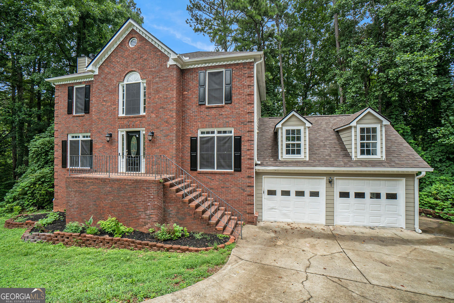 Come experience this 4 Bed/2.5 Bath updated brick home in the cul-de-sac of this unique neighborhood. Renovated from top to bottom- new paint- new carpet - new LVP flooring - new deck. The hardwood entrance is flanked by the living room and cozy family room with a marble face, gas fireplace. The family room flows in an open concept to the kitchen with all SS appliances, granite counters, and an island that has a peninsula breakfast bar. You'll love to entertain family and friends in your formal dining room. The Primary suite has a double trey ceiling and dual fans, along with his/her private closets and lots of cabinet space in the vaulted, sun-filled primary bath for linens and toiletries. Three other generous bedrooms, including one with a vaulted ceiling, share a full bath with granite counter. The large basement has windows and a private entrance with a soft-mat flooring for exercise, game room, and kids play area or convert it to your man-cave media room. You'll love summer barbeques on your renovated deck off the kitchen level that flows down to a second deck at the basement. The front faces west so has energy-saving sunscreens on all windows. This home is a blank slate, ready for you to add your personal touches. Seller will provide a standard 2-10 home warranty on appliances, plumbing, and electric for peace of mind. Located in a prime area near shopping, restaurants, schools, KSU and Lake Allatoona. Quick access to I-575, 75, Hwy 92 and downtown Woodstock, this home combines convenience and comfort. Don't miss out on making this home your own!