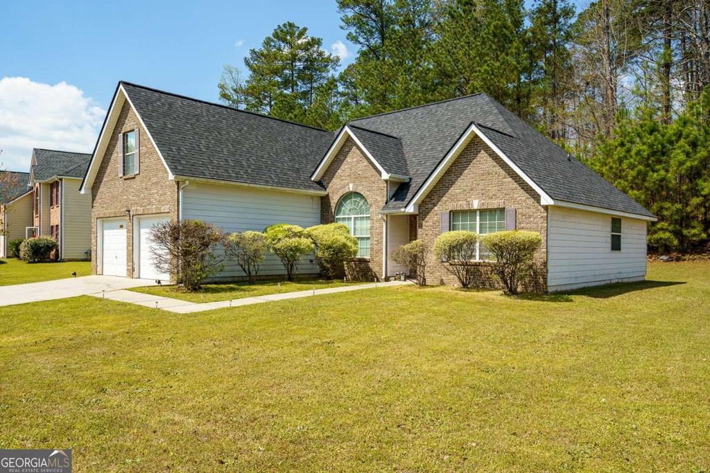 Photo of 6869 Fireside Lane, Atlanta, GA 30349 (MLS # 10724526)