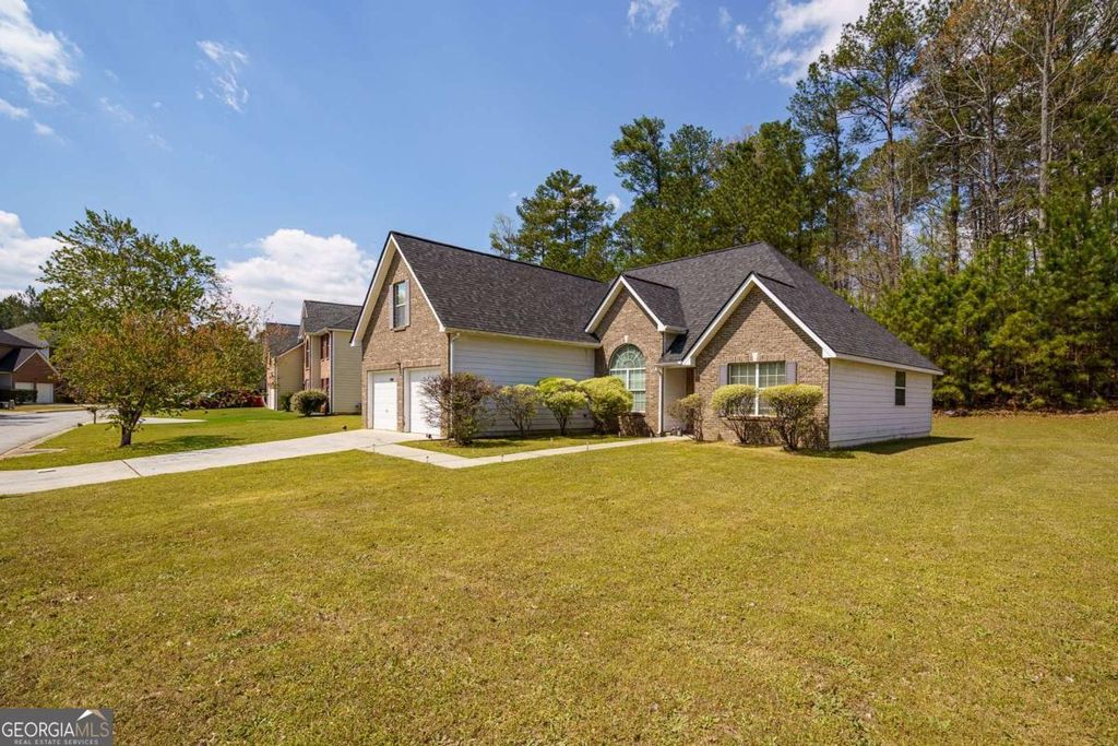 Photo of 6869 Fireside Lane, Atlanta, GA 30349 (MLS # 10724526)