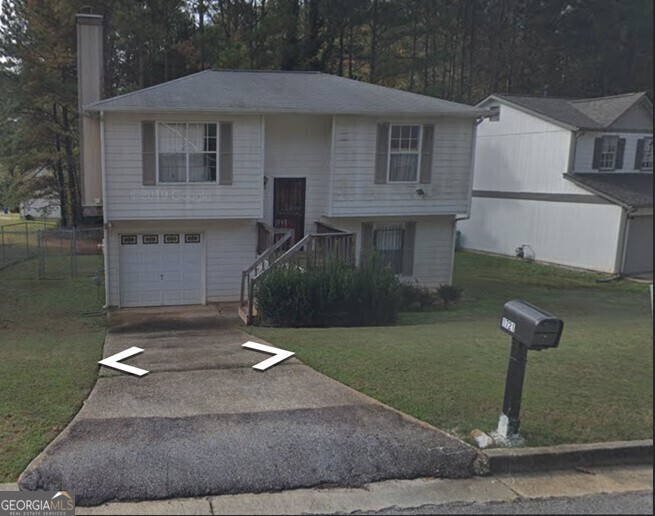 Great oppurtunity to own a home in the popular Gresham Park area of Atlanta. This split foyer plan offers great potential for a growing family or roommates. This property is for buyers looking to add their personal touch in an area where some adjacent homes have already been updated or fully renovated. The desirable Gresham Park area offers easy access to I-20 and the location is ideal for those who desire a suburban feel while being close to amenities like East Atlanta Village, Grant Park, and downtown Atlanta. The property will be sold AS IS. The listing agent is the property owner.