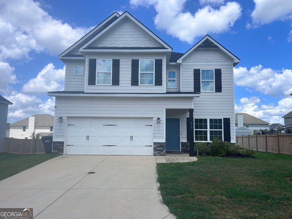 Photo of 310 E River Cane Run Run, PERRY, GA 31069 (MLS # 10822351)