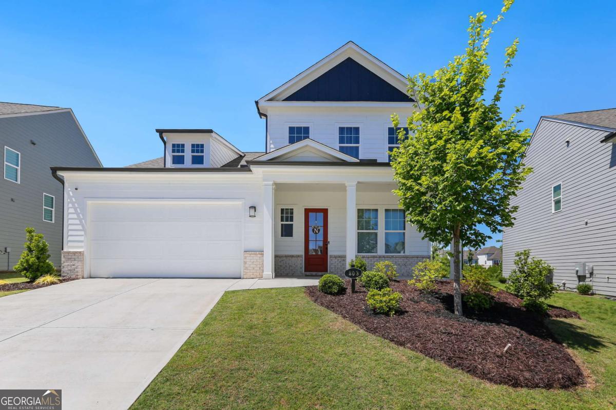 This EXCEPTIONALLY crafted home , FRESHLY PAINTED, offers 4 spacious bedrooms, 2.5 bathrooms, and a flexible front room perfect as a home office, study, or even a fifth bedroom to suit your lifestyle needs. The main-level primary suite provides a private retreat with a huge walk-in closet and a serene, restful atmosphere. The open-concept living area flows seamlessly from the gourmet kitchen-featuring quartz countertops, stainless steel appliances, a large island, and designer tile backsplash-into the dining area and inviting family room, ideal for entertaining or everyday living. Outdoor living is just as impressive, with a spacious patio overlooking a private yard, perfect for relaxing, grilling, or hosting gatherings. Upstairs, you'll find three additional bedrooms, all with walk-in closets, and a shared hall bath, offering plenty of space and privacy for family or guests. Set within the sought-after Edgewater community, residents enjoy an impressive suite of amenities including a full-size clubhouse with a fitness center and catering kitchen, swim and tennis facilities, a playground, and scenic lakeside walking trails perfect for peaceful strolls and sunset views. Incentives available - Seller offering $4,000 lender credit with acceptable offer via preferred lender. Conveniently located between Downtown Woodstock and Canton, with shopping, dining, and entertainment just minutes away. Zoned for top-rated Cherokee County schools: Hickory Flat Elementary, Dean Rusk Middle, and Sequoyah High. Don't miss your chance to own this stylish, functional, and comfortable home in one of Cherokee County's most desirable communities!