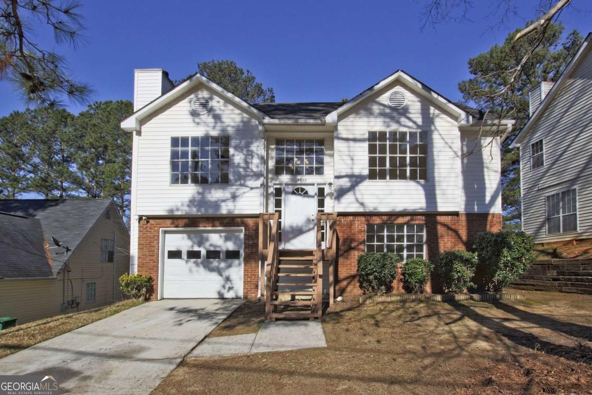 For Lease: Welcome home to this charming 3-bedroom, 2-bath split-level located in a highly sought-after neighborhood. This split-level design maximizes space and flexibility, with the bottom level offering an additional spacious living room along with a private bedroom and full bath-perfect for guests, in-laws, or a quiet retreat. The main level features a galley-style kitchen with ample cabinet space and direct access to a private deck overlooking the expansive backyard, ideal for relaxing, entertaining, or enjoying outdoor activities. Upstairs, you'll find a generously sized master suite and comfortable secondary bedrooms, providing plenty of room for everyone. This home is offered semi-furnished, including select living room, bedroom, and kitchen furnishings, making your move-in seamless and convenient. With its versatile floor plan, large backyard, and prime location close to shopping, dining, schools, and parks, it provides the perfect balance of comfort and convenience. Available now - don't miss this opportunity to lease a well-maintained, semi-furnished split-level home. Schedule your private tour today!"