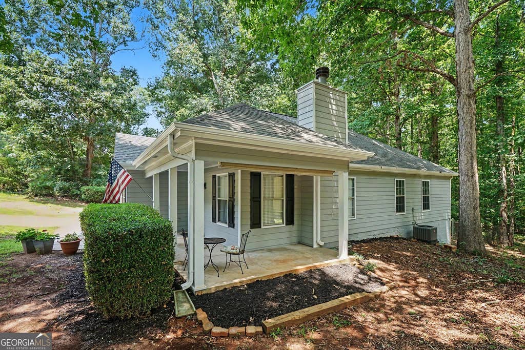 Photo of 50 Mountainside Lane, Covington, GA 30016 (MLS # 10817411)