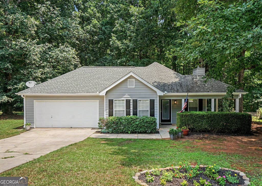 Photo of 50 Mountainside Lane, Covington, GA 30016 (MLS # 10817411)